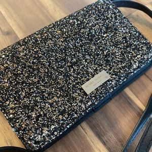 Henri Bendel wallet/cell phone holder on chain.